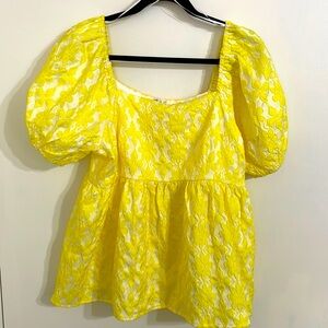 Never worn Yellow short sleeve with balloon arms blouse. Aline type waist.